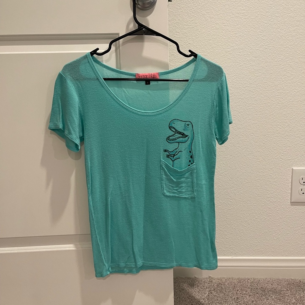 Sugar high dinosaur top with pocket. Size small.